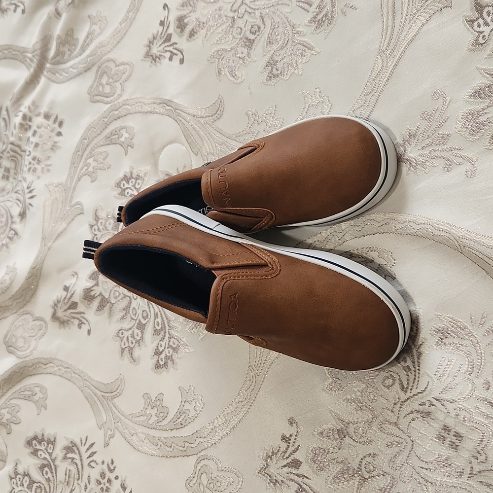 Brand new (without tag) brown Nautica shoes.